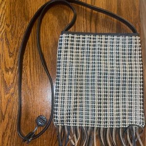 The Sak Woven Black & Brown Leather and Crochet Bag with Fringe Bottom